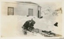 Image of To-ark-ta-ga mending a sledge at Amadjuak